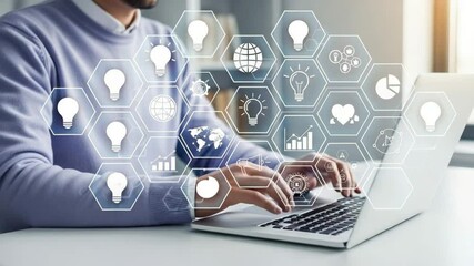 Aufkleber - Person typing on laptop with digital icons overlaying the screen in bright office environment