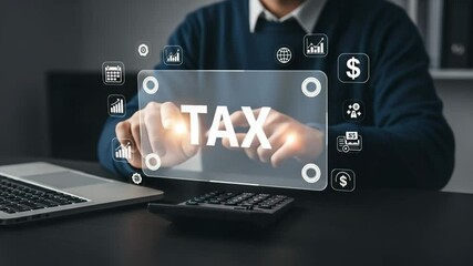 Poster - Man holding a tax graphic with laptop and calculator on a desk in an office setting at eye level view