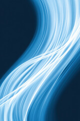 Wall Mural - abstract blue light trails on dark background for futuristic digital design