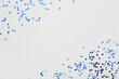 © Pixel-Shot - Beautiful blue confetti in shape of star on grey background