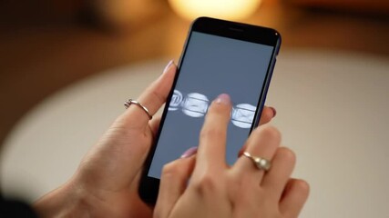 Poster - Woman Hands Holding Blue Mobile Phone with Contact Icons on Screen Indoor