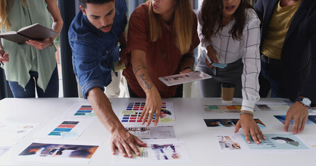 Poster - Creative, meeting and business people with documents for planning, brand design and portfolio. Collaboration, teamwork and workers with notes, color palette and project layout for marketing strategy