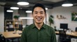 © Pro DG Collections - A confident Asian man with a bright smile, captures the essence of professional success in a modern office setting. The image radiates positivity.