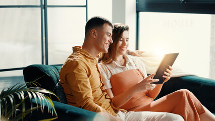 Poster - Smile, couple and relax with tablet at house for social media, browsing internet and bonding. Happy, people and digital for streaming online, search movie and app subscription for film entertainment
