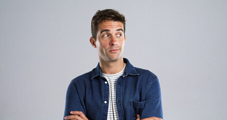Aufkleber - Man, thinking and curious for decision in studio for listen to gossip, hear rumor and fake news. Mockup space, person and spying for information, suspicious and interesting story on white background