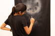 © ADDICTIVE STOCK - Young indian woman artist in creative process