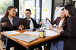 © SOMKID - Group of Asian business working plan analysis project brainstorm in modern office, Asian businesspeople team working together, Business startup and company strategy planning concept.