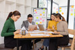 © SOMKID - Group of business people working together with dashboard analysis and data management in conference room, Corporate business and dashboard to presentation concept.