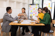 © SOMKID - Group of business people working together with dashboard analysis and data management in conference room, Corporate business and dashboard to presentation concept.