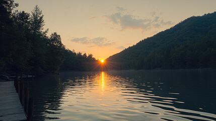 Aufkleber - Serene sunrise over calm lake with gentle ripples, surrounded by forested hills and wooden dock, peaceful mood