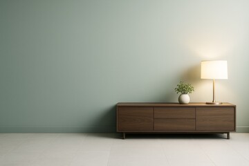 Aufkleber - Minimalist modern interior room with wooden sideboard, lamp and plant on tiled floor, blank green wall background for design mockup or branding concept.