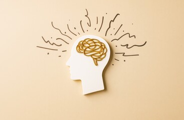 Aufkleber - Creative human head silhouette with golden brain illustration and abstract thought lines on light beige background concept of idea and intelligence.