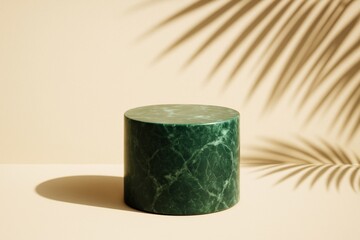 Poster - Minimal green marble cylinder pedestal with palm leaf shadow on beige background, showcasing modern creative light and stylish graphic concept.
