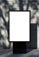 Poster - Minimalist blank billboard on a black pole, set against a gray concrete wall with tree branch shadows