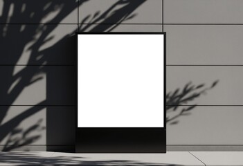 Poster - Minimalist blank billboard on a black pole, set against a gray concrete wall with tree branch shadows