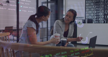 Poster - Image of financial data and graphs over diverse female coworkers in office