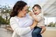 © ADDICTIVE STOCK - Mother and baby spending quality time in the park
