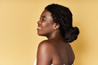 © LIGHTFIELD STUDIOS - Radiant beauty of a young woman in a vibrant studio setting showcasing skincare