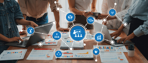 Leinwandbilder - Diverse professionals collaborate in a modern office setting, utilizing technology and data analysis to enhance creativity, communication, and productivity for business success. Amity