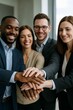 © Alihan - Unified Vision: A diverse group of professionals, with hands interlocked, symbolizing collaboration, unity, and the powerful synergy of shared goals.
