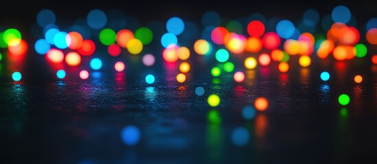 Vibrant bokeh lights on dark surface