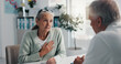 © Wesley25/peopleimages.com - Hospital, doctor and patient with chest pain, healthcare or medical appointment for help or talking. Consultation, man and listening to symptoms of angina, checkup and senior woman with pressure