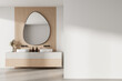 Modern bathroom interior with wooden paneling, dual sinks, abstract mirror and large empty white wall for poster or branding mockup template backdrop. 3D Rendering