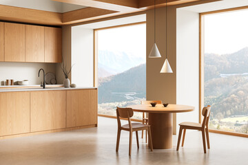 Fototapete - Minimalist wooden kitchen interior with round dining table and panoramic mountain view through large windows in natural light setting. 3D Rendering