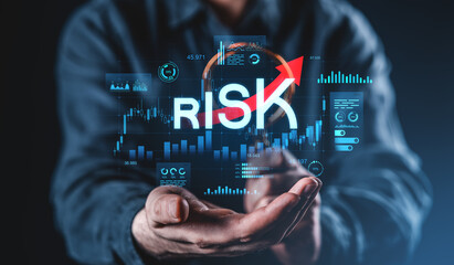 Poster - Businessman holding glowing forex chart with rising risk concept hologram.