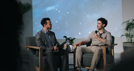 Fototapete - Talk show, men and interview with questions, tablet or conversation with entrepreneur. Communication, people or guest with presenter, discussion or share experience for startup or business management