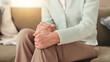 © Claytonon/peopleimages.com - Knee pain, hurt and senior person with arthritis, stiffness and medical condition in home and hands. Healthcare, sore and pensioner with muscle tension, osteoporosis and massage for legs in house