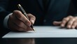 © Kadang Kesel - Business Person Signing Legal Document with Fountain Pen