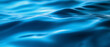 © Vitor - Textura Azul Vibrante. Close-up de uma superfície lisa com padrões ondulados sutis, gradientes suaves e reflexos de luz suaves