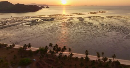 Wall Mural - Colorful sunset or sunrise above the sea surface,Aerial view drone fly over open sea,Reflected sun beautiful light of nature on water surface,Sunset over ocean,Sea summer and travel vacation concept