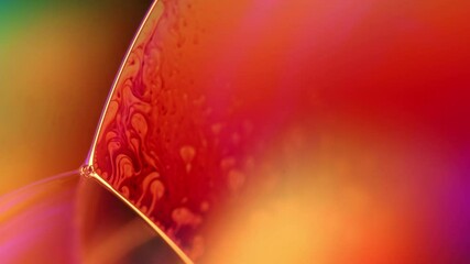Poster - Orange coloured liquid surface, fluid effect, bright chemistry, liquid glass, interference pattern 