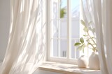 White curtains blowing in open window with vases and plant on sill