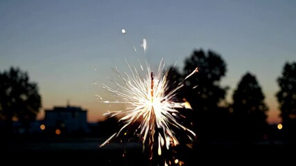 Wall Mural - there is a sparkler that is lit up in the dark