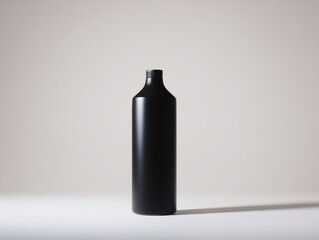 Poster - Matte Black Bottle on White Surface, Ideal for Product Mockups and Minimalist Branding Campaigns, Showcasing Modern Elegance : Generative AI