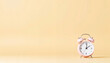 © Людмила Денисова - Pink alarm clock on a pastel background with copy space
