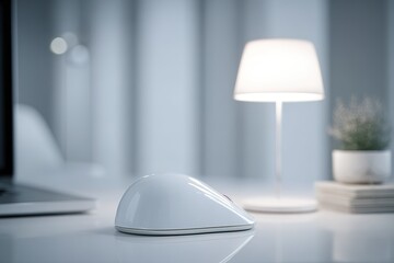 Poster - Modern workspace featuring a sleek white mouse beside a lamp and potted plant in a minimalist environment