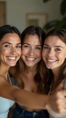 Poster - Three women smiling and posing for a selfie