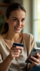 Poster - A woman smiling while holding a credit card and looking at her phone, possibly checking accounts or transactions