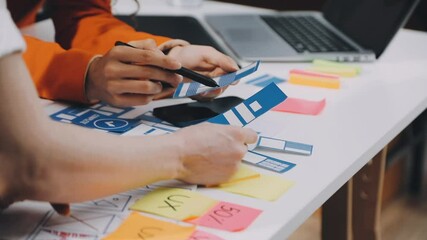 Business Team Collaborating on UXUI Design for System Development with Creative Planning and Prototype