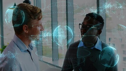 Poster - Two male professionals conversing in office initiating swirling holographic globes for analysis