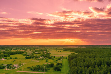 Wall Mural - rural landscape at sunset. countryside in the evening. aerial view