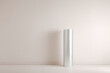 © Marko - sleek ultrabright metallic cylinder stands prominently against clean neutral background