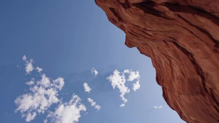 Poster - Exploring the stunning rock formations and shadows in a canyon during midday sunlight