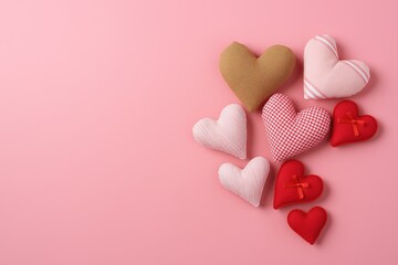 Poster - collection of heart-shaped objects in various colors and patterns, such as red, white, and gingham, arranged on pink background.