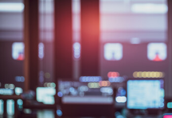 Poster - Blurred control room with monitors and lights creating an abstract industrial scene.futuristic photos with premium quality for poster and banner backgrounds