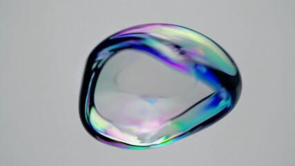 Poster - Iridescent soap bubble floating on a white background
